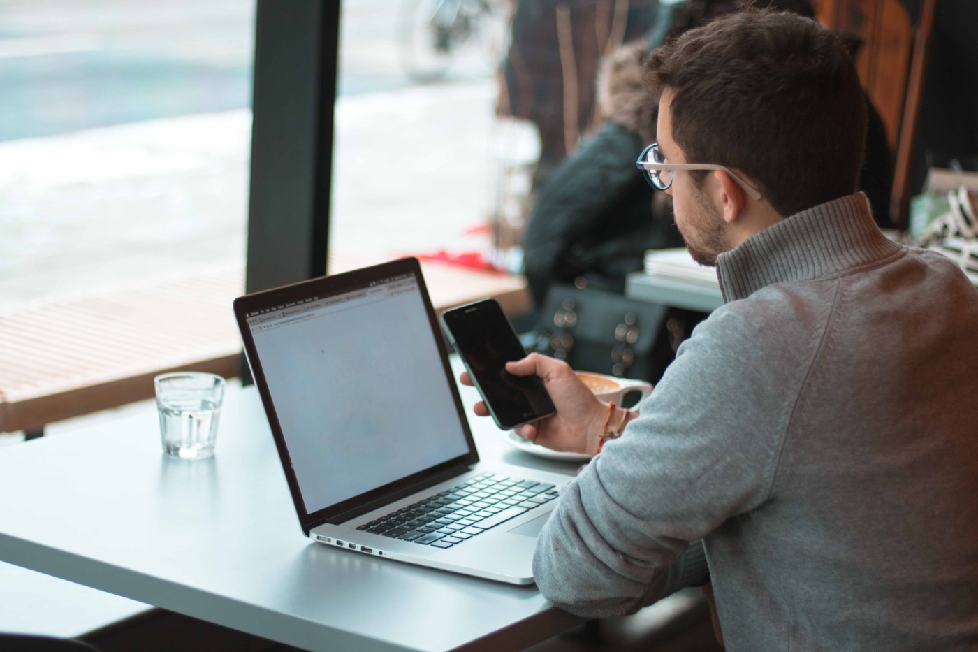 man laptop phone